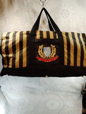 Black & Gold Striped Travel Duffel Bag with Embroidered Crest